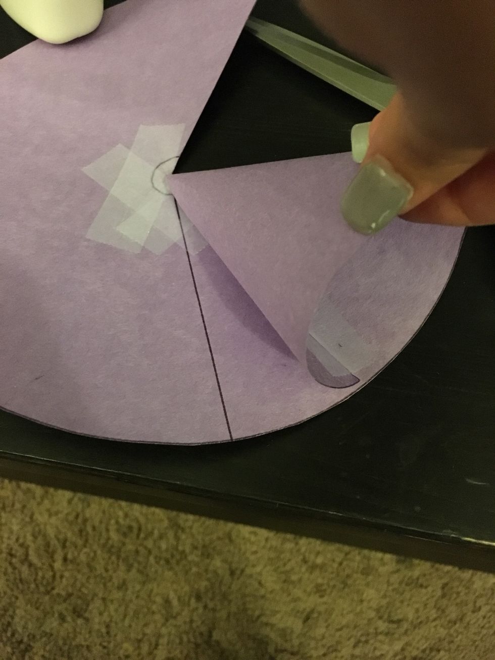 Draw another line about an inch away from the cone.