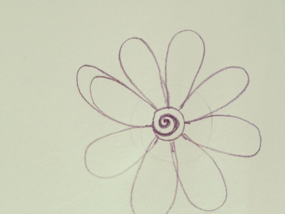Draw another loop above the petals like this.
