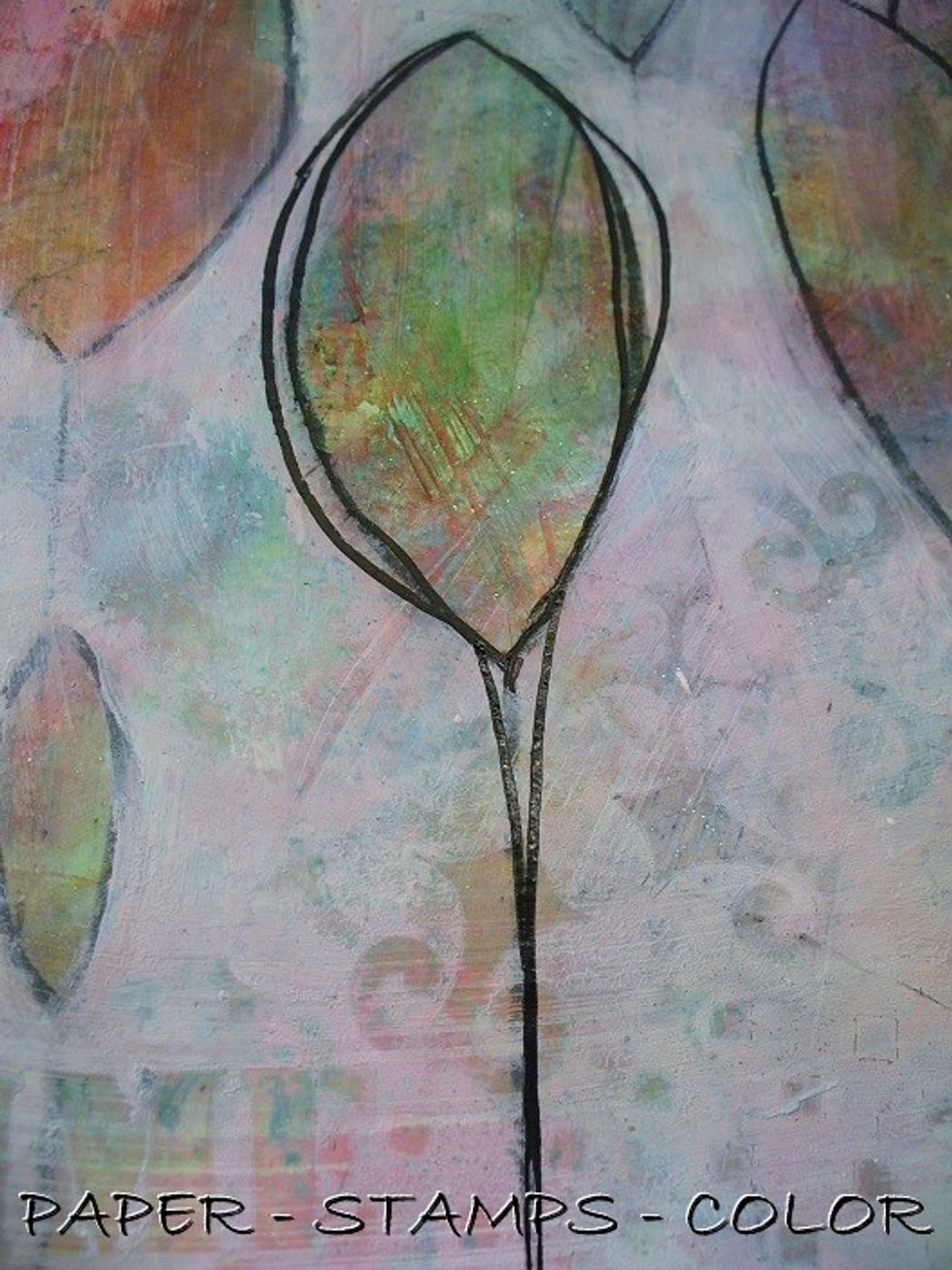 Draw around the shapes with a black acrylic marker as shown, and add the stems again.