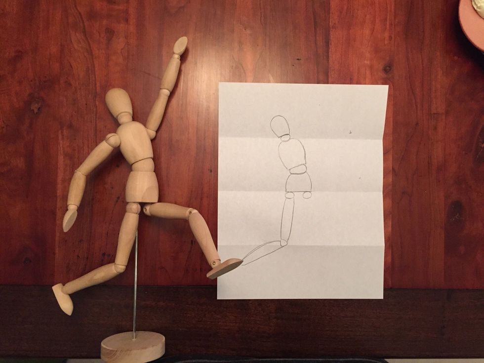 Draw Bob's calf. His calf should be the same length as his thigh. Use your pencil as a measuring tool to check.