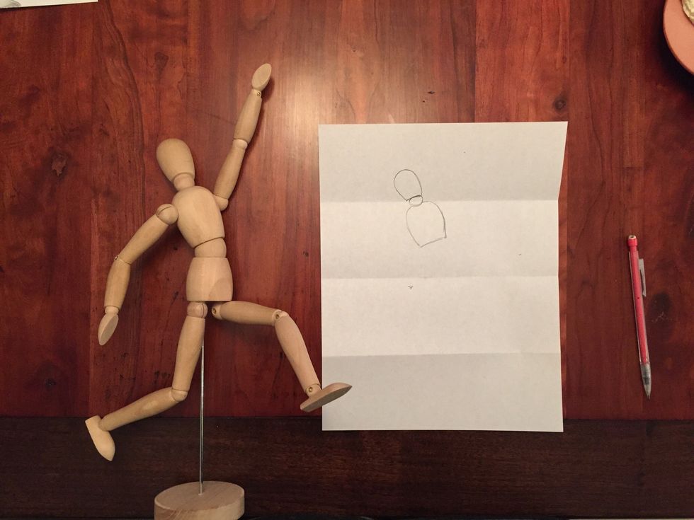 Draw Bob's chest. Bob's chest should be wider than his head. Bob's chest should come halfway down in your second section.