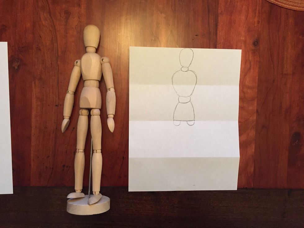 Draw Bob's hip joints. They are ovals on each side under Bob's hips.