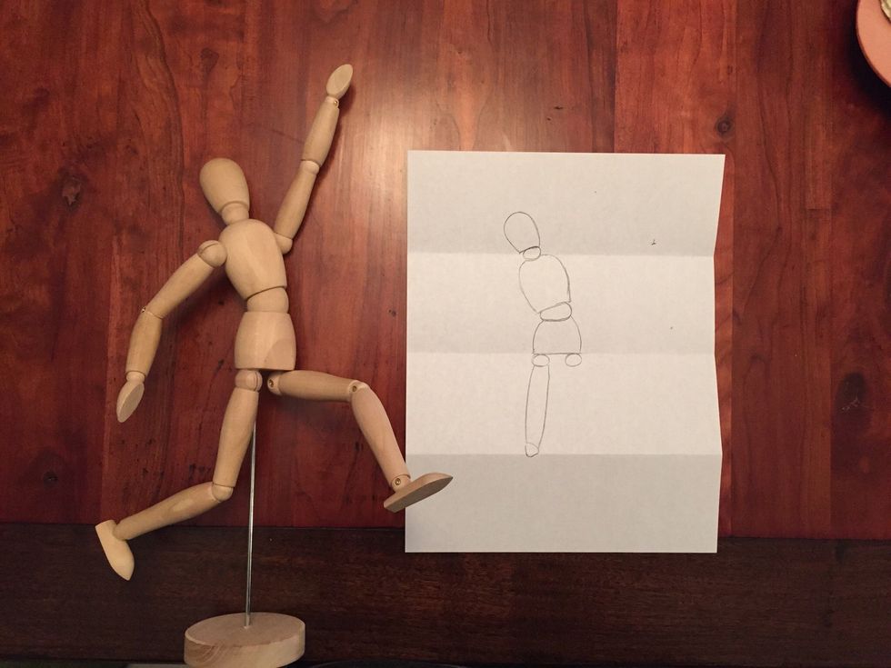 Draw Bob's left knee. A circle.