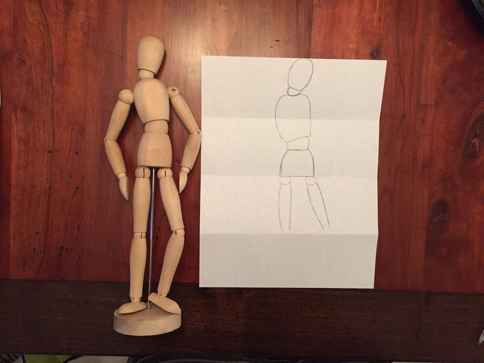 Draw Bob's right thigh. Bob's right thigh is tilted and also fills the third section.