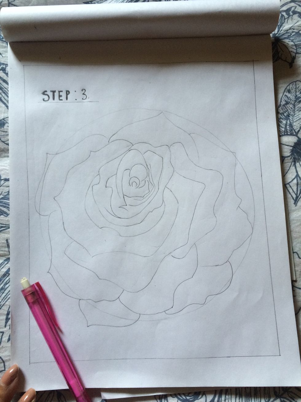 Draw curved spirals inside.