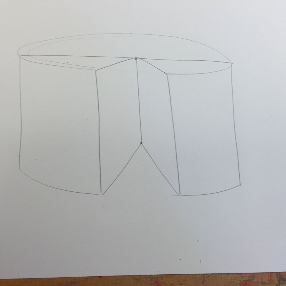 Draw diagonal lines from the bottom of the cake back to the bottom of the horizontal line.