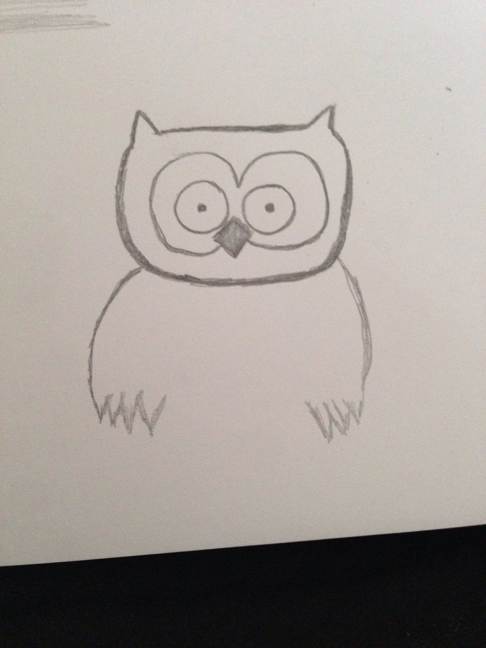 Draw down each side from the head, at the end of each line, draw three/four upside down triangles with the base rubbed out. These are the wings