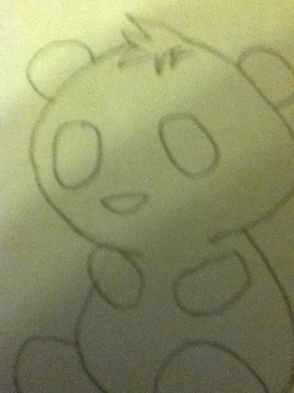 Draw eyes and a nose. (sorry for the blur!)