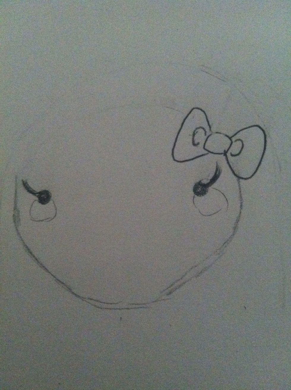 Draw eyes and head (include the bow if you want)