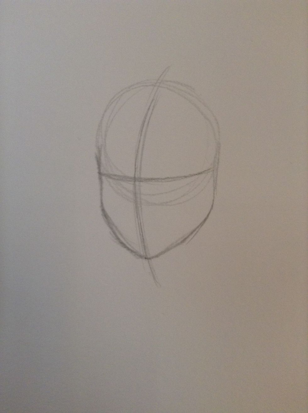 Draw guidelines for the head. I'm drawing her in 3/4 view.