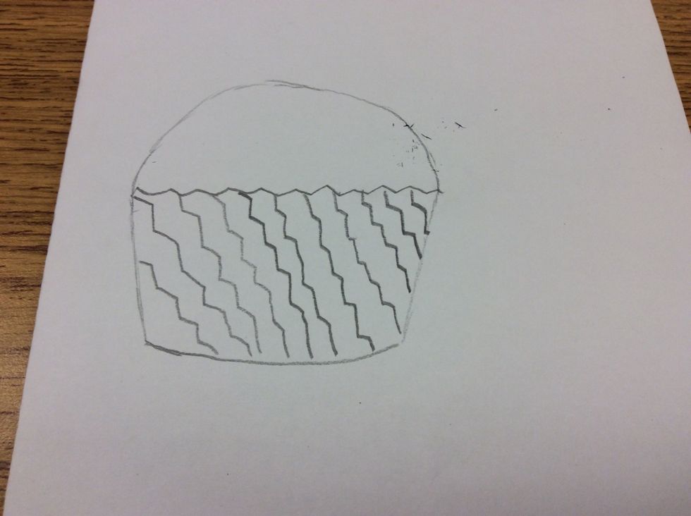 Draw half a circle on top of the tin