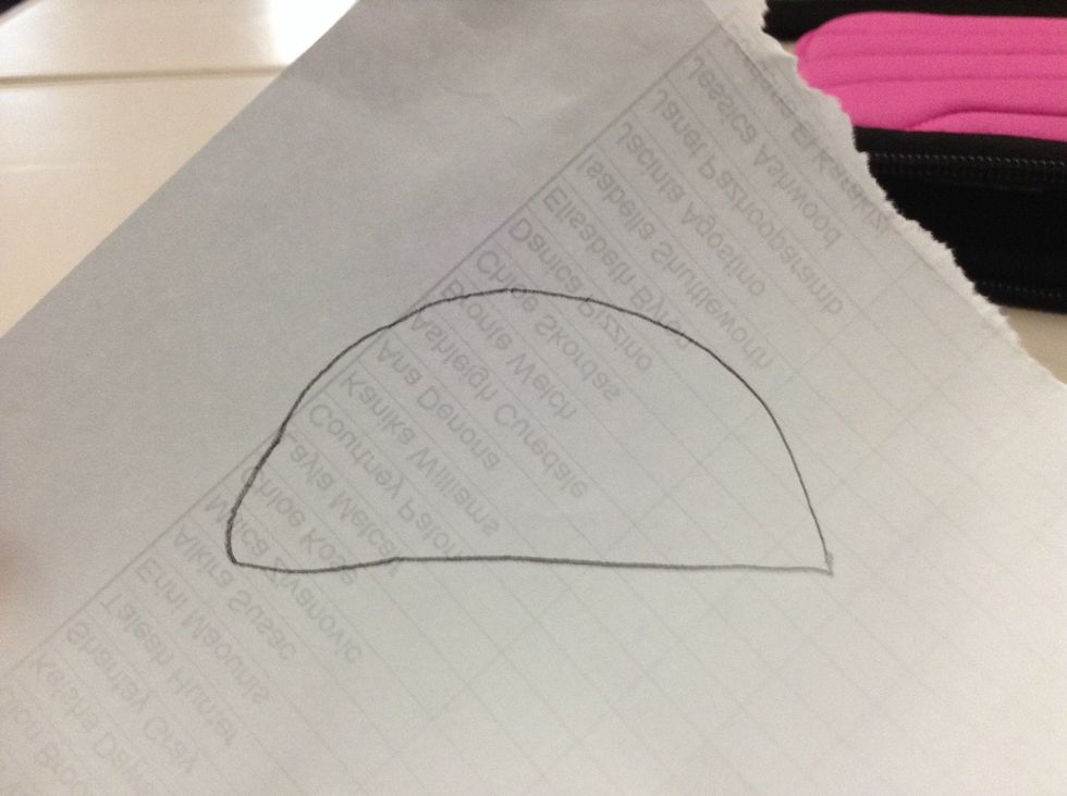 Draw half a circle with the straight side facing down.