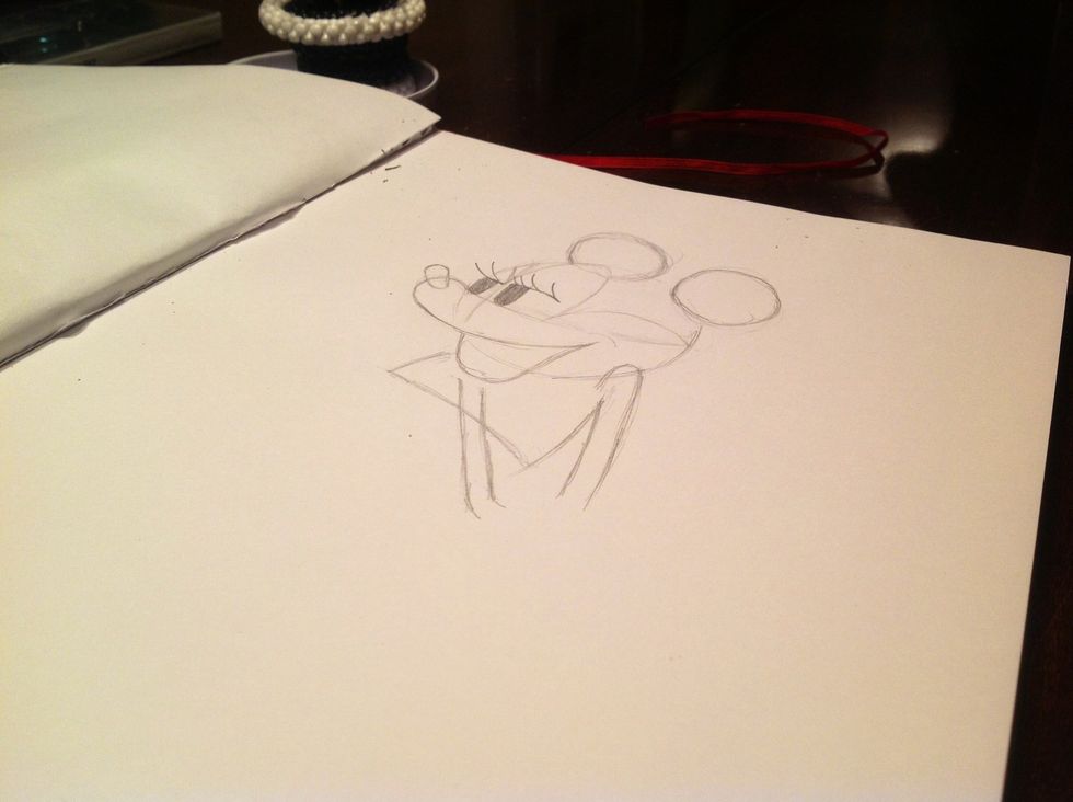 Draw her torso and arms. As you can see she has a little swing in her body