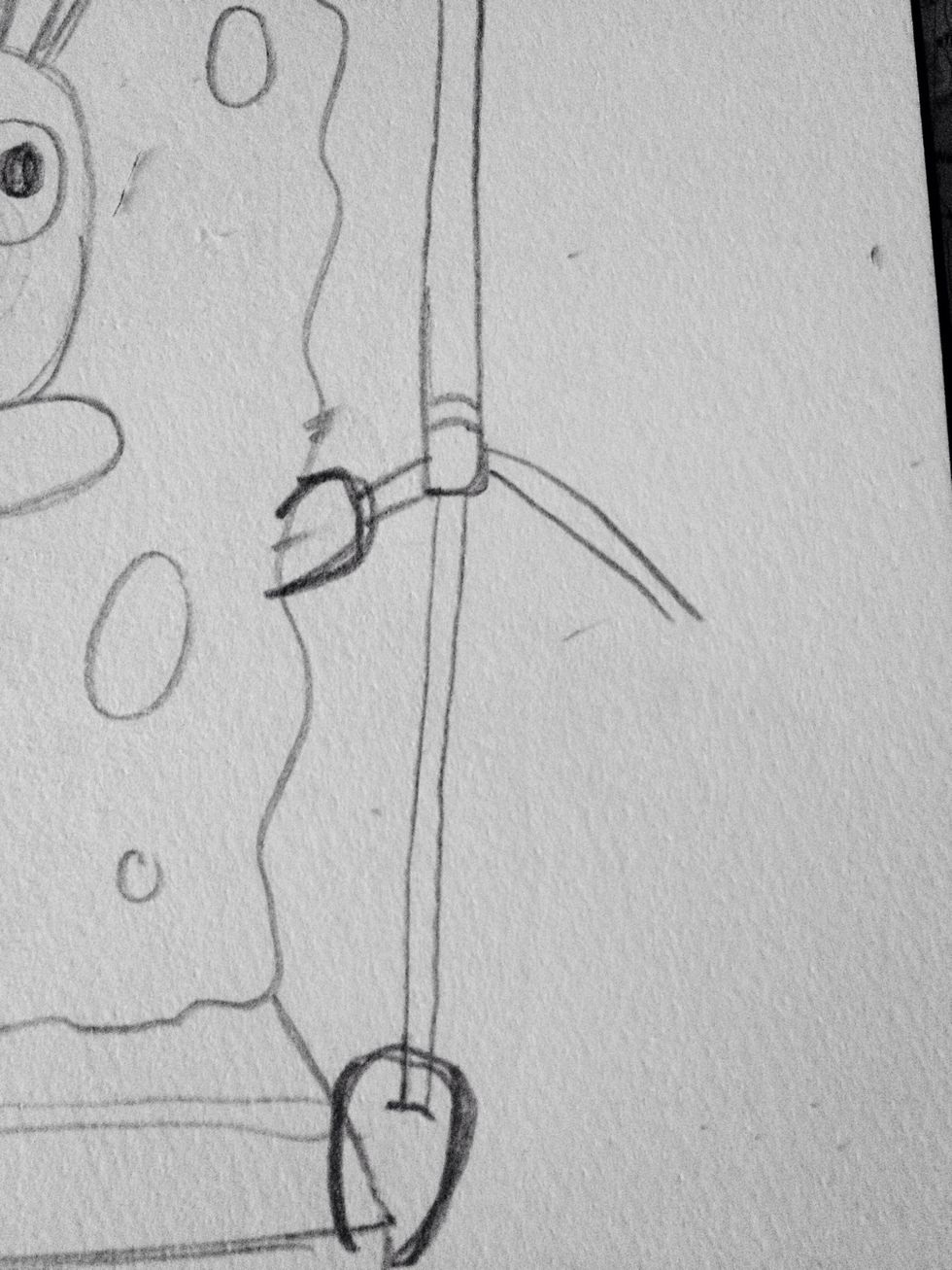 Draw his arm going behind his leg.