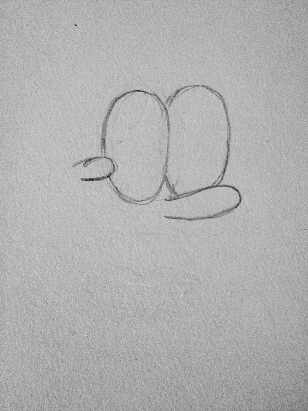Draw his cheek in front of the left eye.