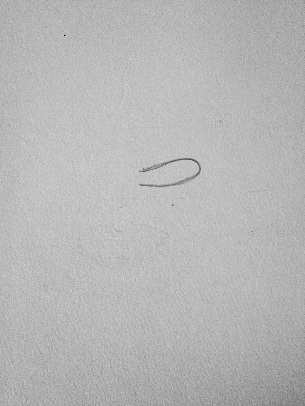Draw his nose.