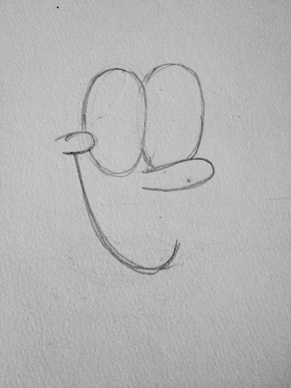 Draw his smile coming down from the middle of the cheek. (By the way the cheek should have freckles, I actually forgot to do that!)