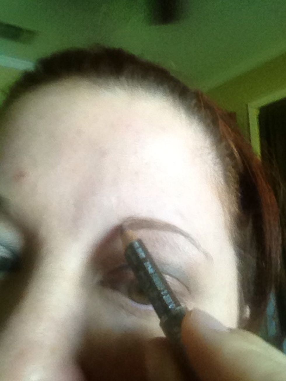 Draw in eyebrows evenly and longer