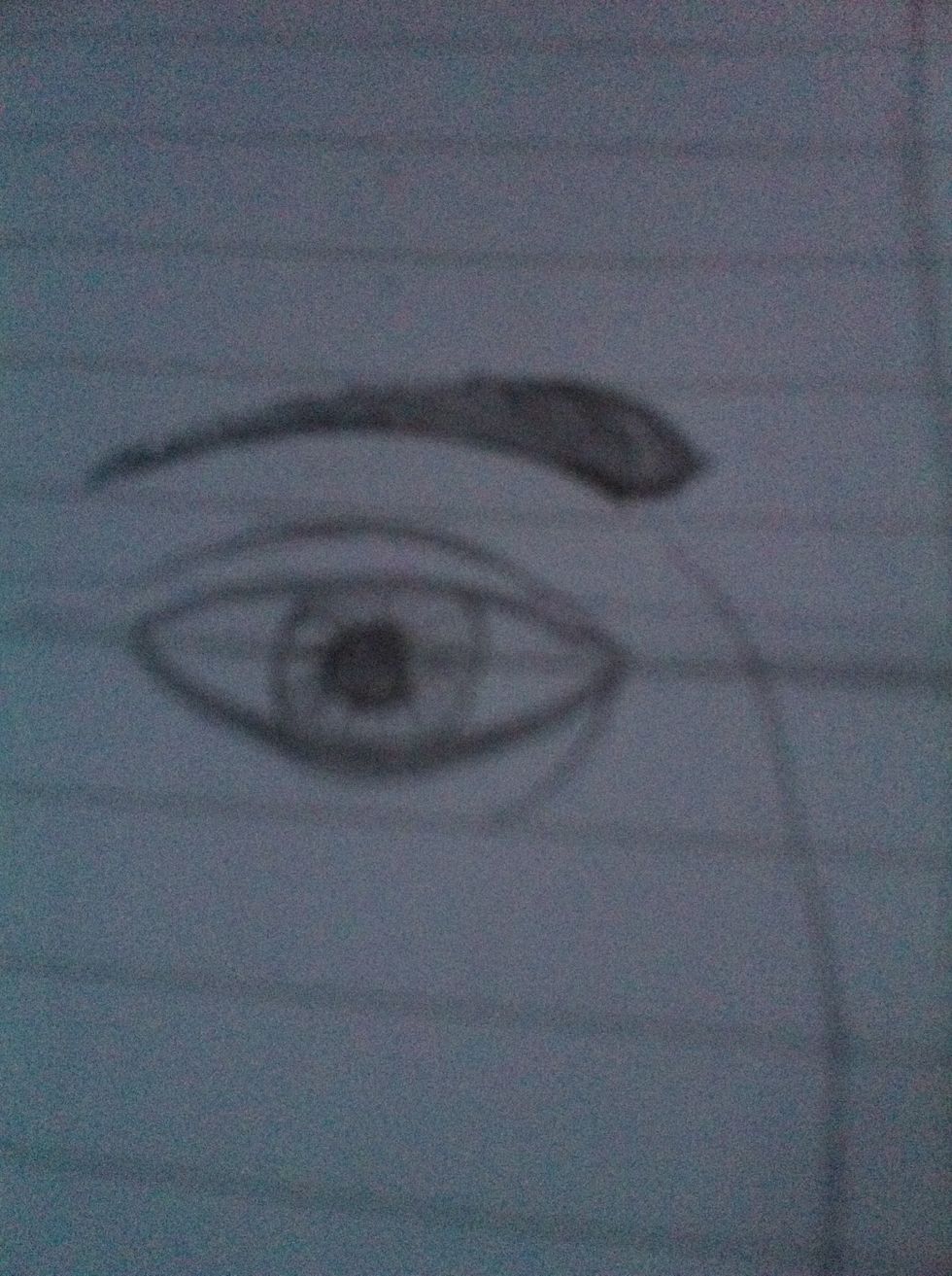 Draw in hair by doing curved lines from the inside out