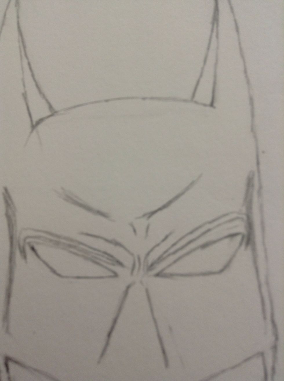 Draw indentions in his forehead.