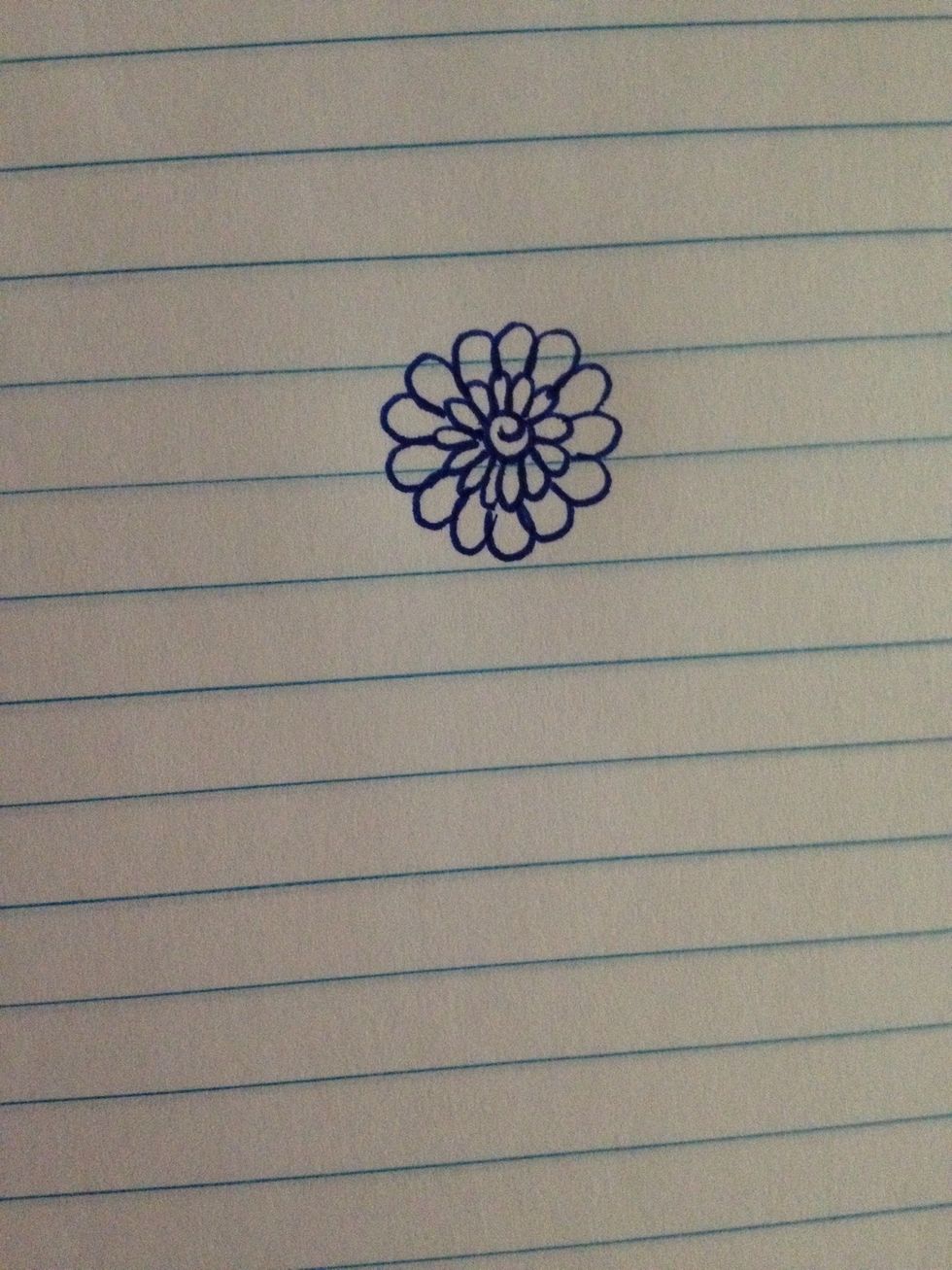 Draw larger petals around the small set of petals.