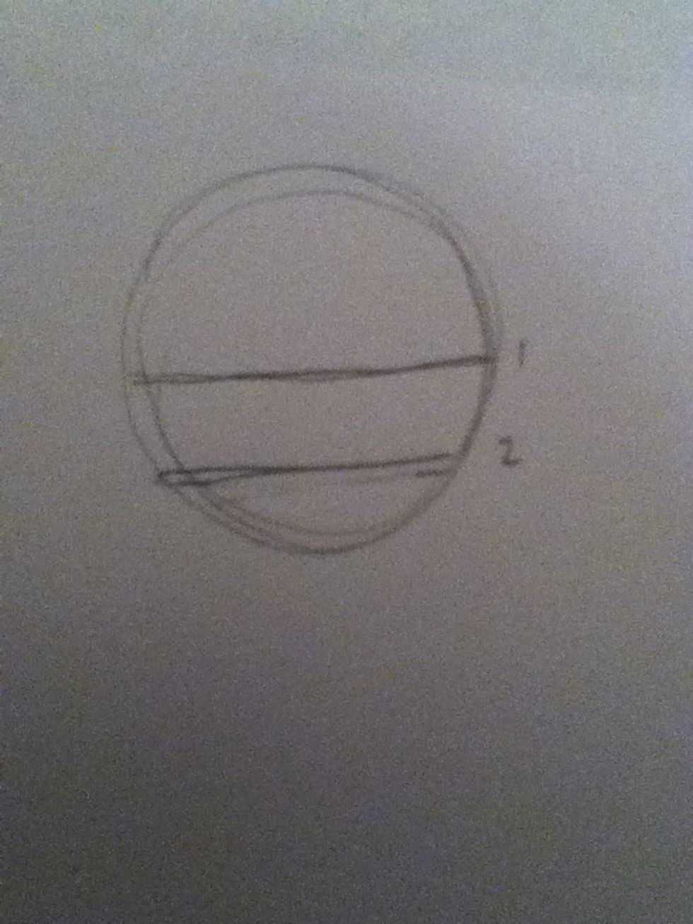 Draw line in middle of the circle and then one in between the bottom of the circle and the first line