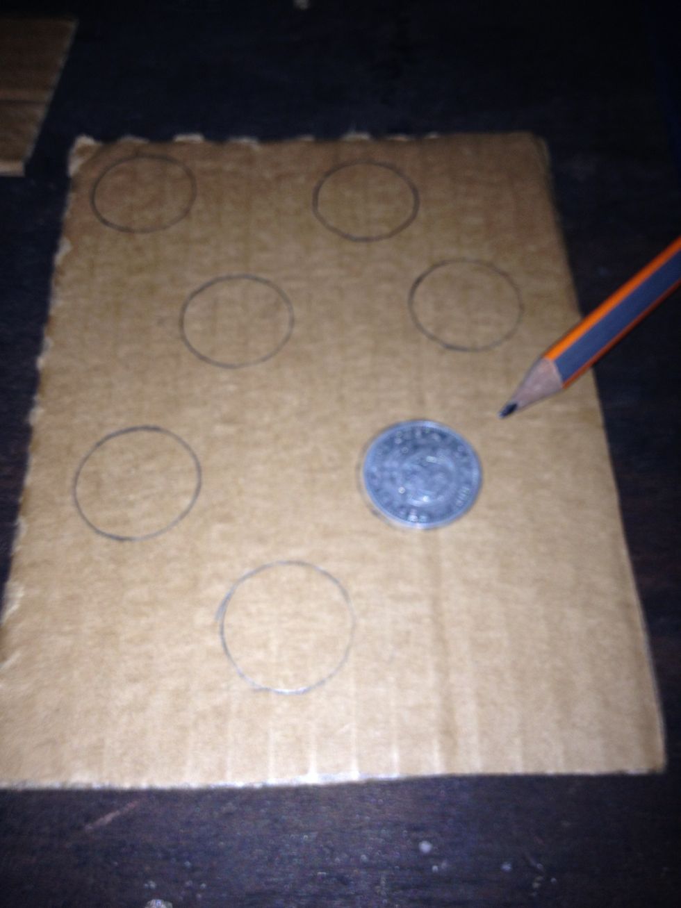 Draw many holes as you want, you can use a coin