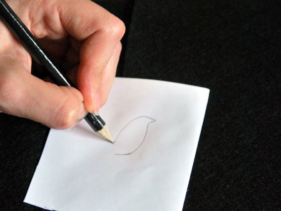 Draw on page schematic figure of a bird. If you do not succeed alone, you can search the internet the birds silhouette and print the desired size.