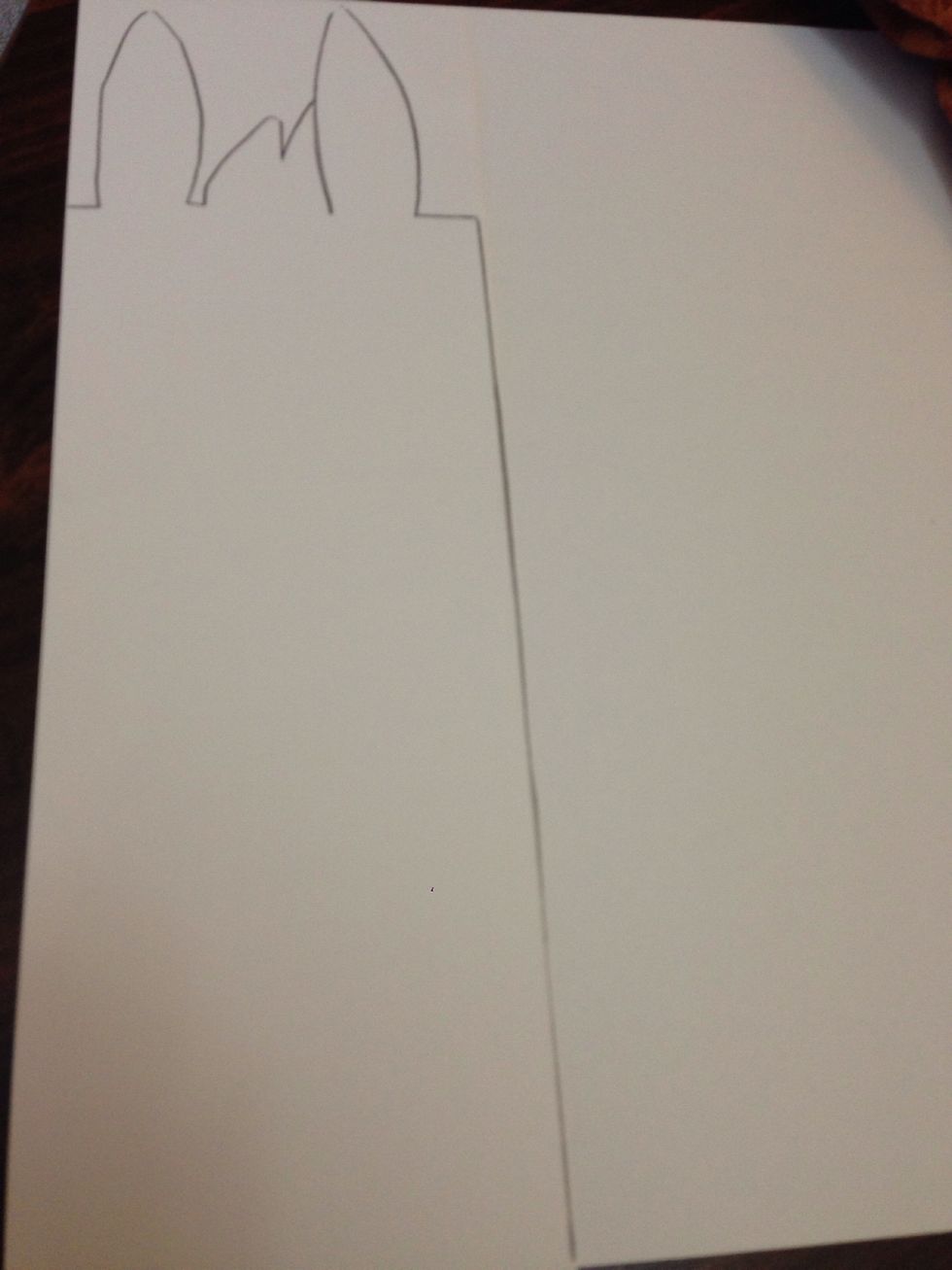 Draw out your bunny on a sheet of paper like Above. You want to have two large rectangles and a small rectangle in the middle, and ears on the very top.