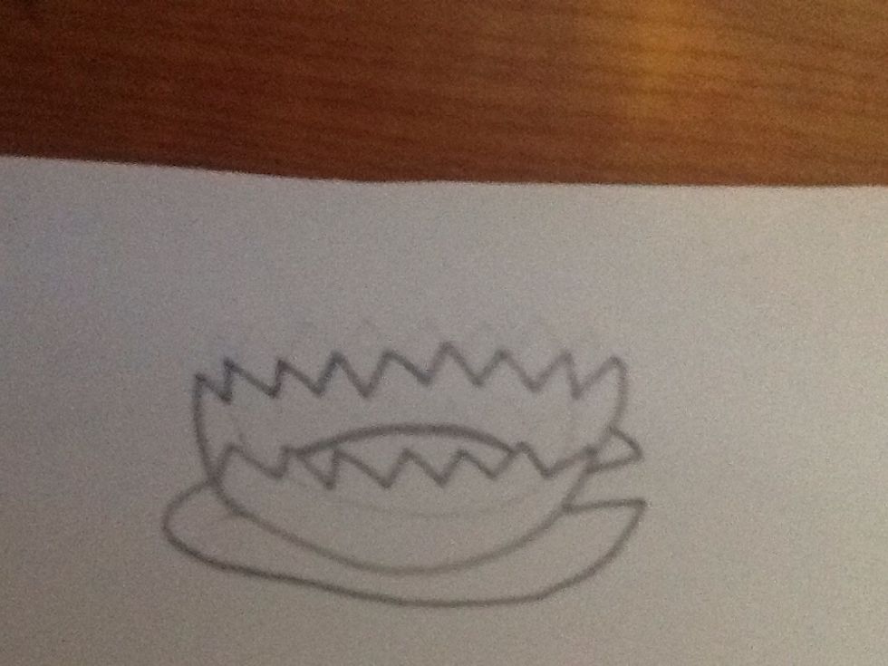 Draw part of a circle between the front and back petals of the flower.