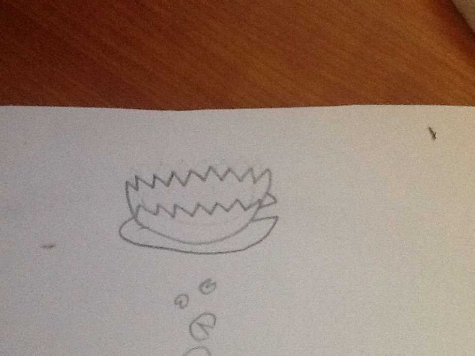 Draw part of a lily pad under the lily pad flower.