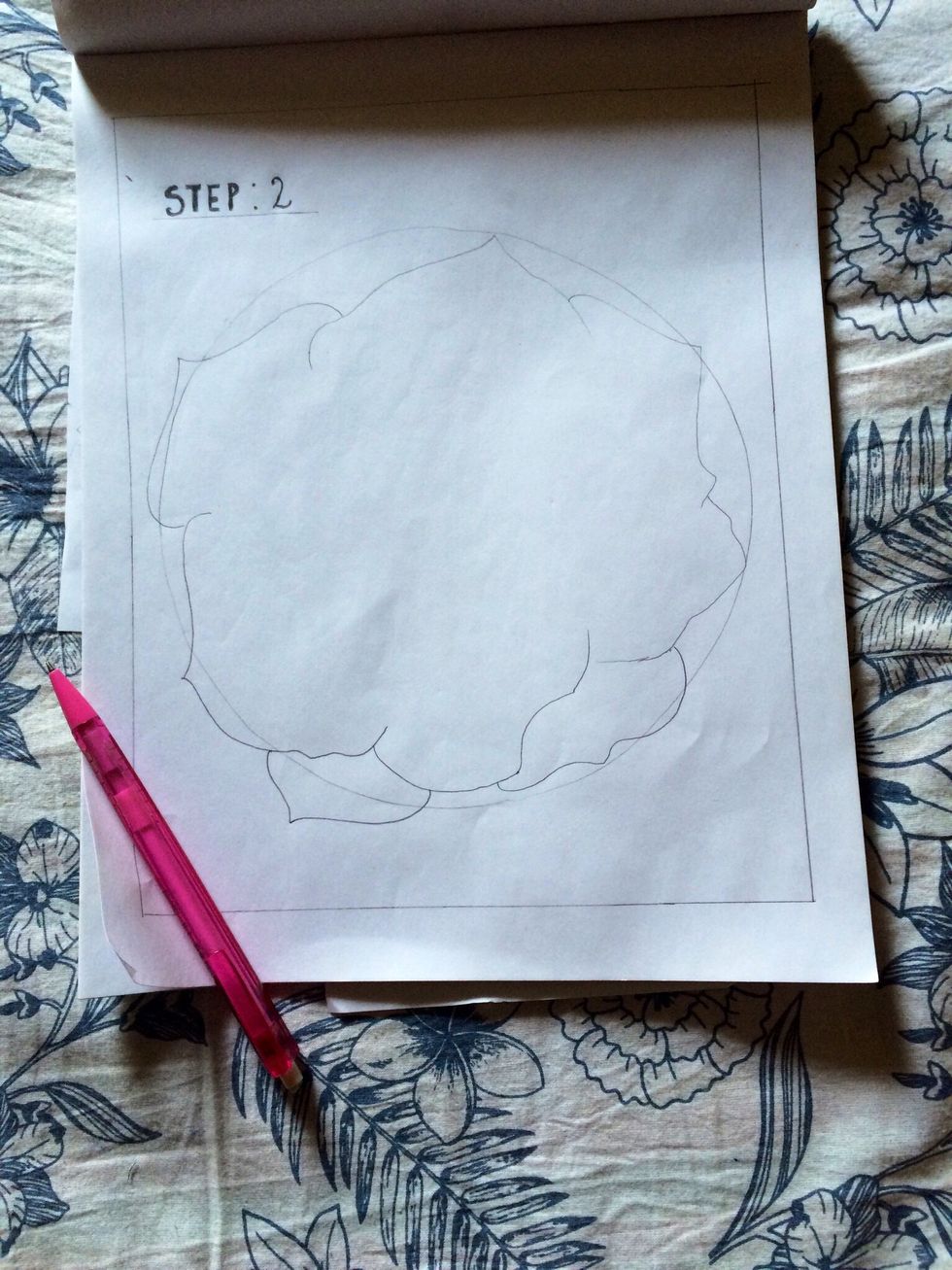 Draw petals around the circle.