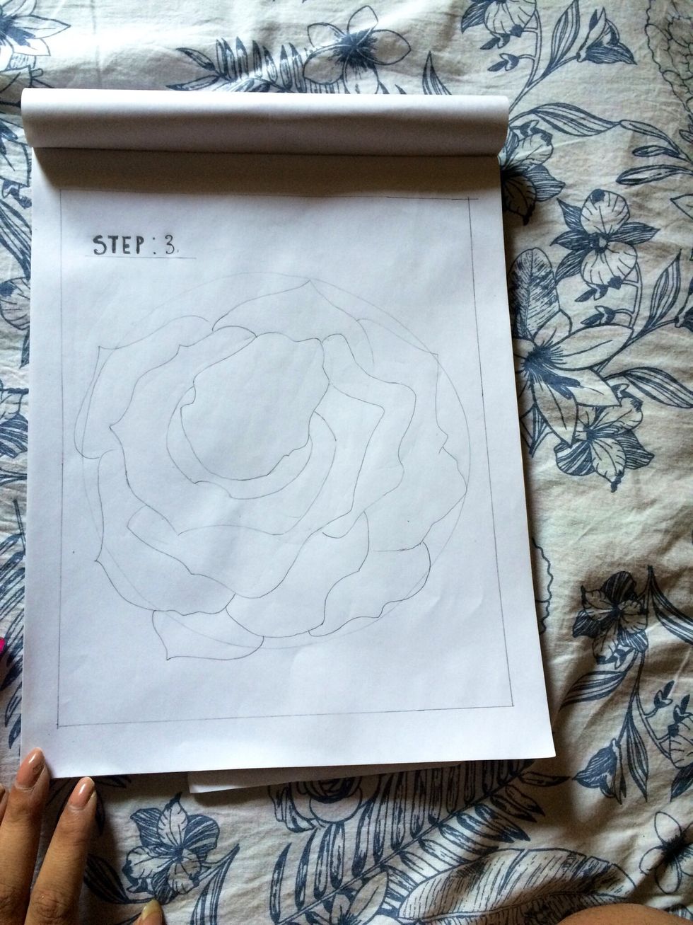 Draw petals around the oval.