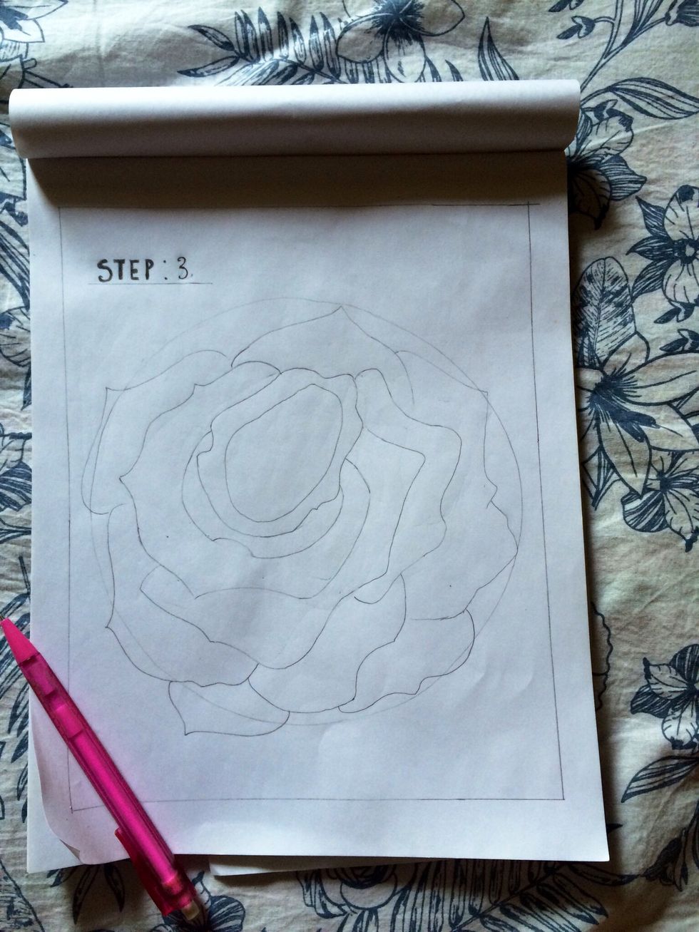Draw petals around the oval.