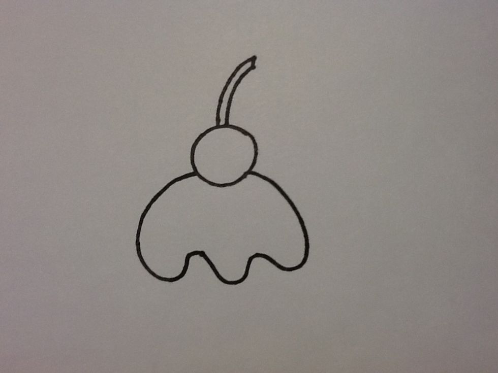 Draw some chocolat drizzle or what ever its called :)