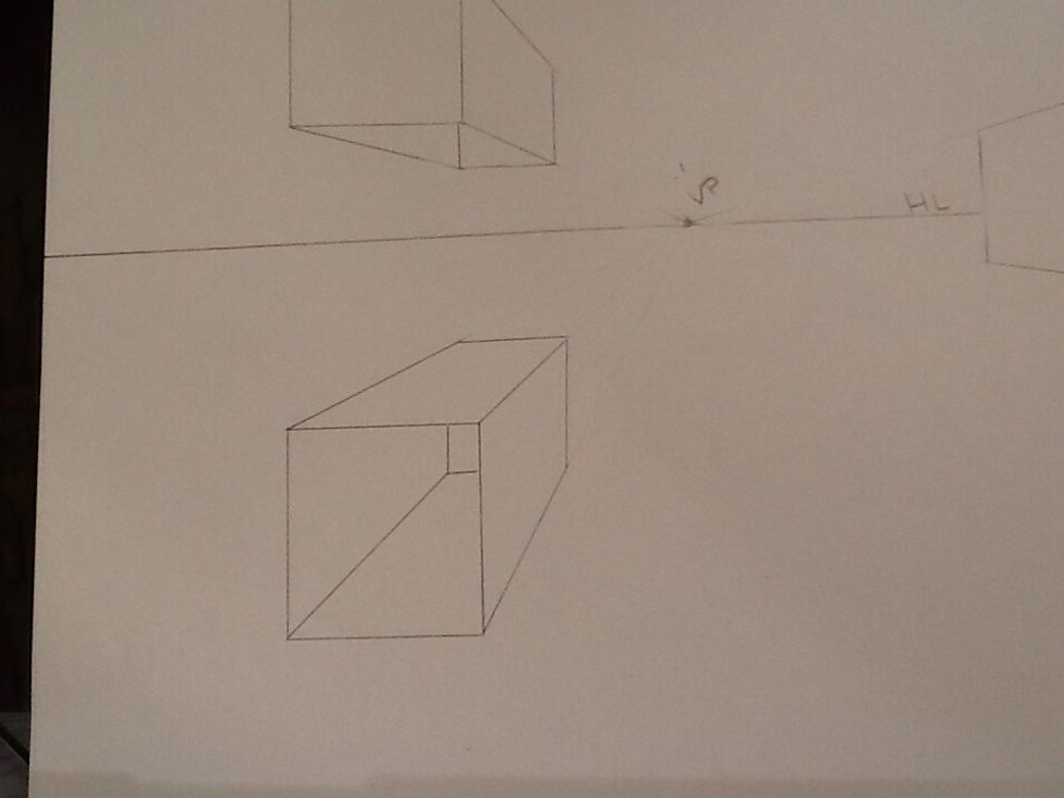 Draw the back wall of your box. Line your ruler up with the outside corners to create the back.