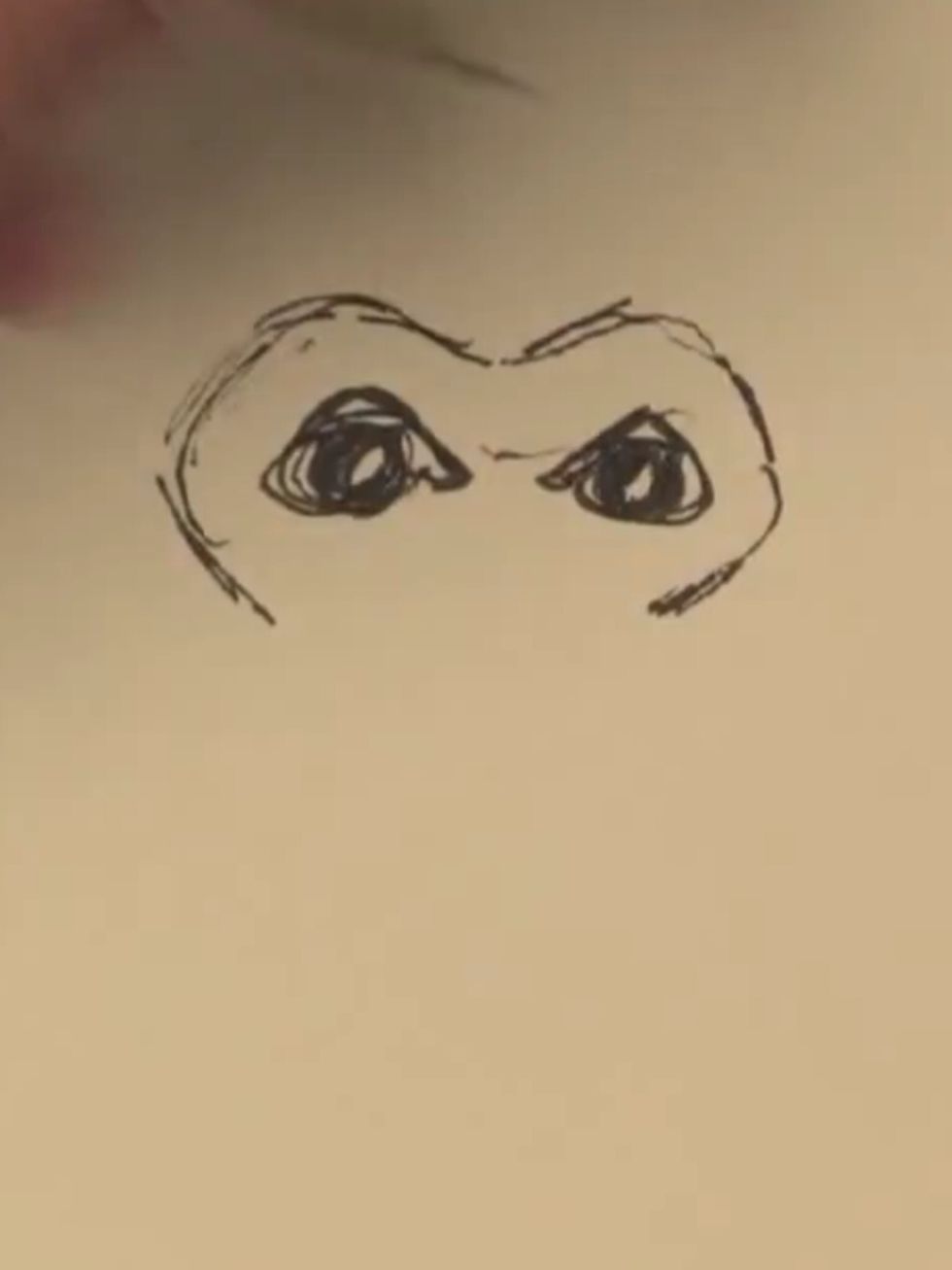 Draw the cheeks....