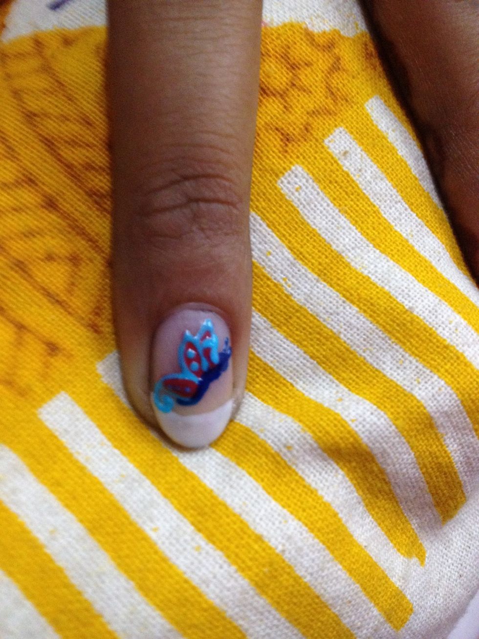 Draw the details.outline the wings and I put dots for the Wind design.its too small to fit anything else.