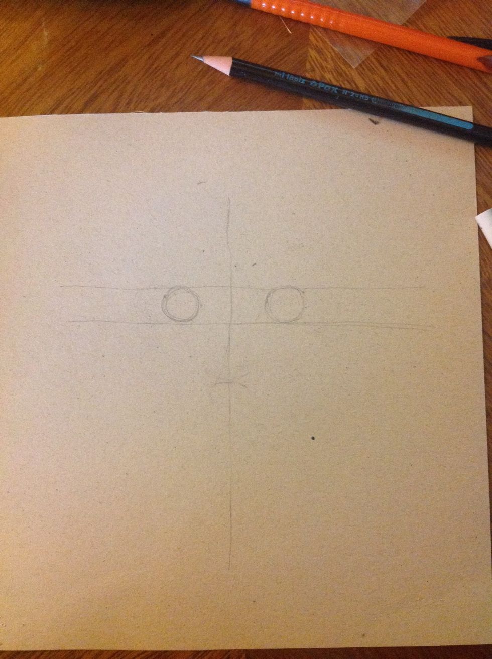 Draw the eyeballs, the distant between them will be the wide of our nose. Try to make an equal distance between the eyeball an the vertical line.