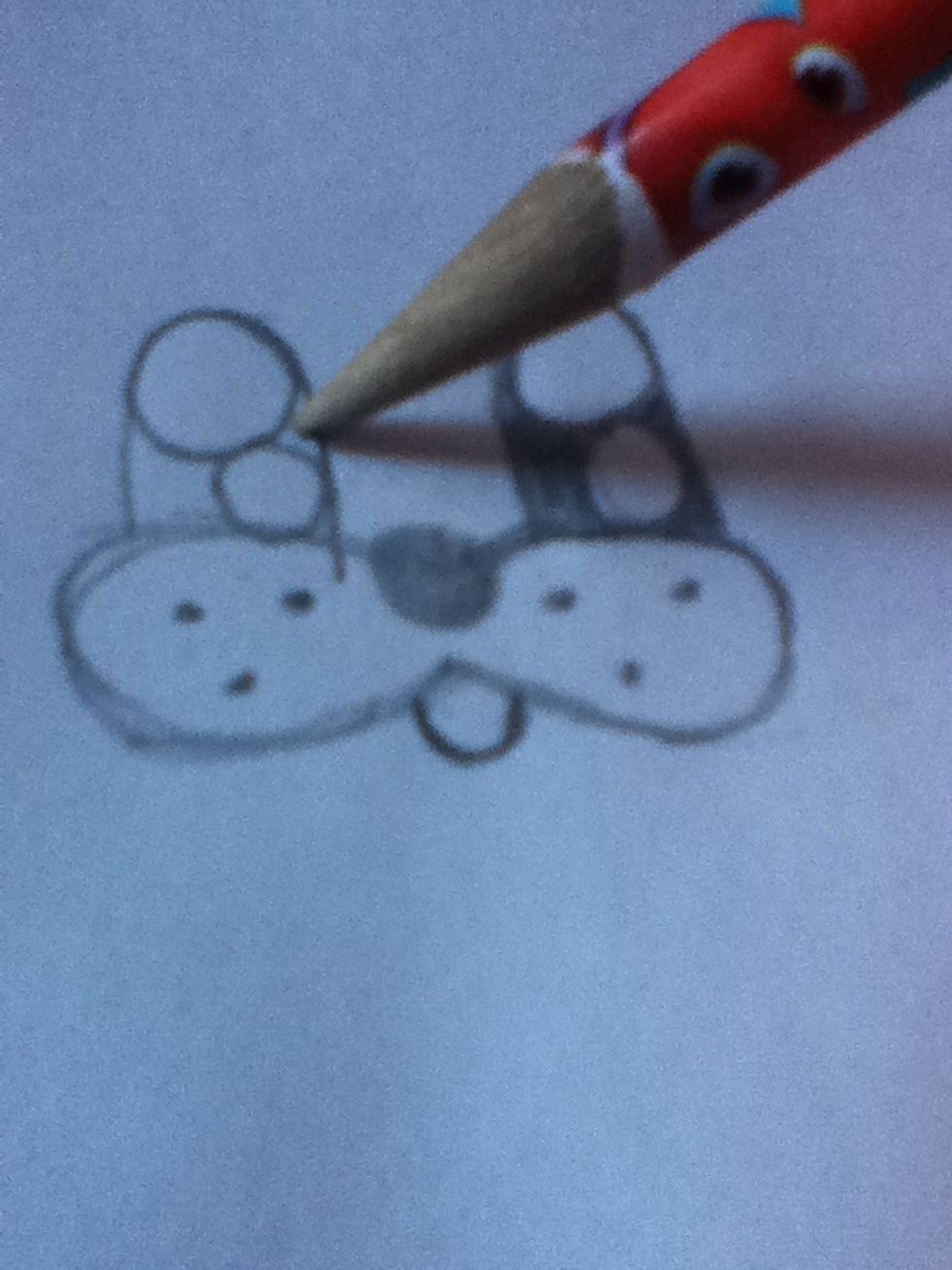 Draw the eyes like this and colour in the rest.