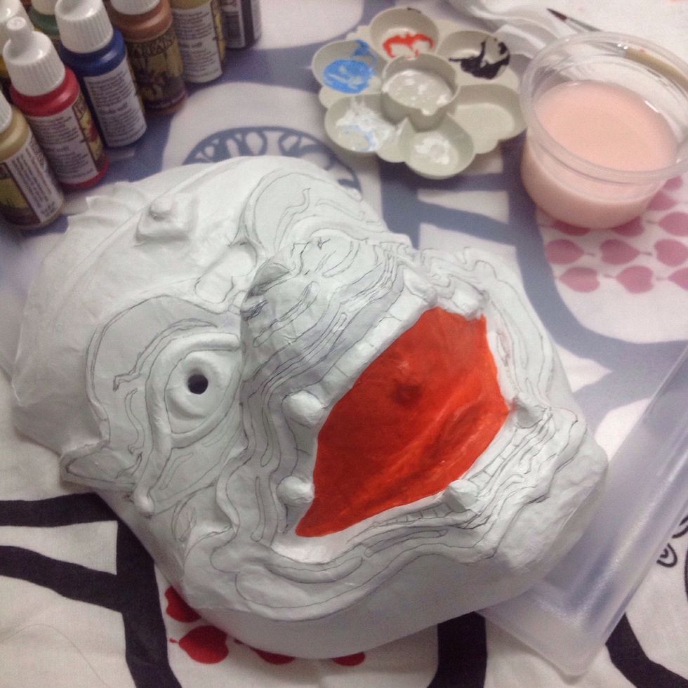 Draw the face lines on the mask.
