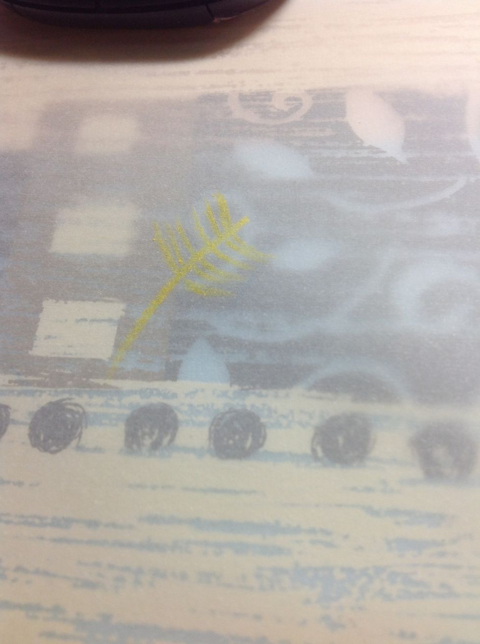 Draw the feathers on, leaving the bottom half blank