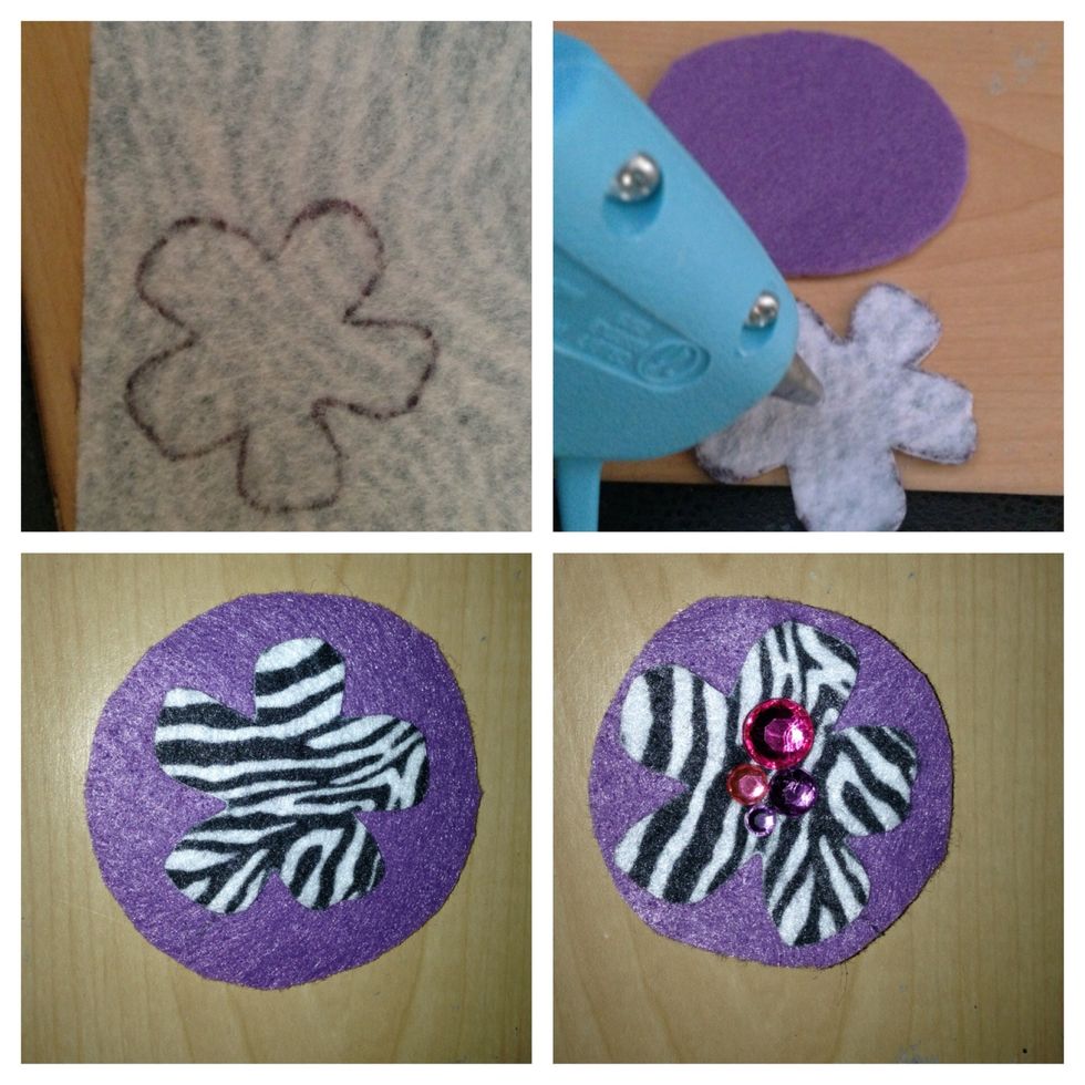 Draw the flower in the felt sheet then cut it. With the hot glue gun place one in top of the other one and add rhinestones.