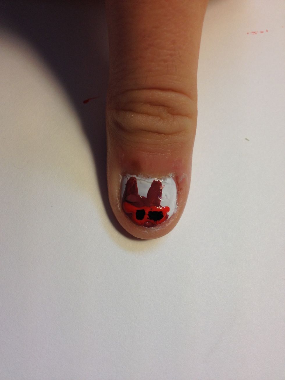 Draw the frames of the glasses and then the lenses.