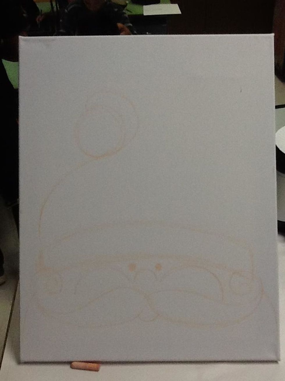 Draw the left side of the cap with a curvy line like this.