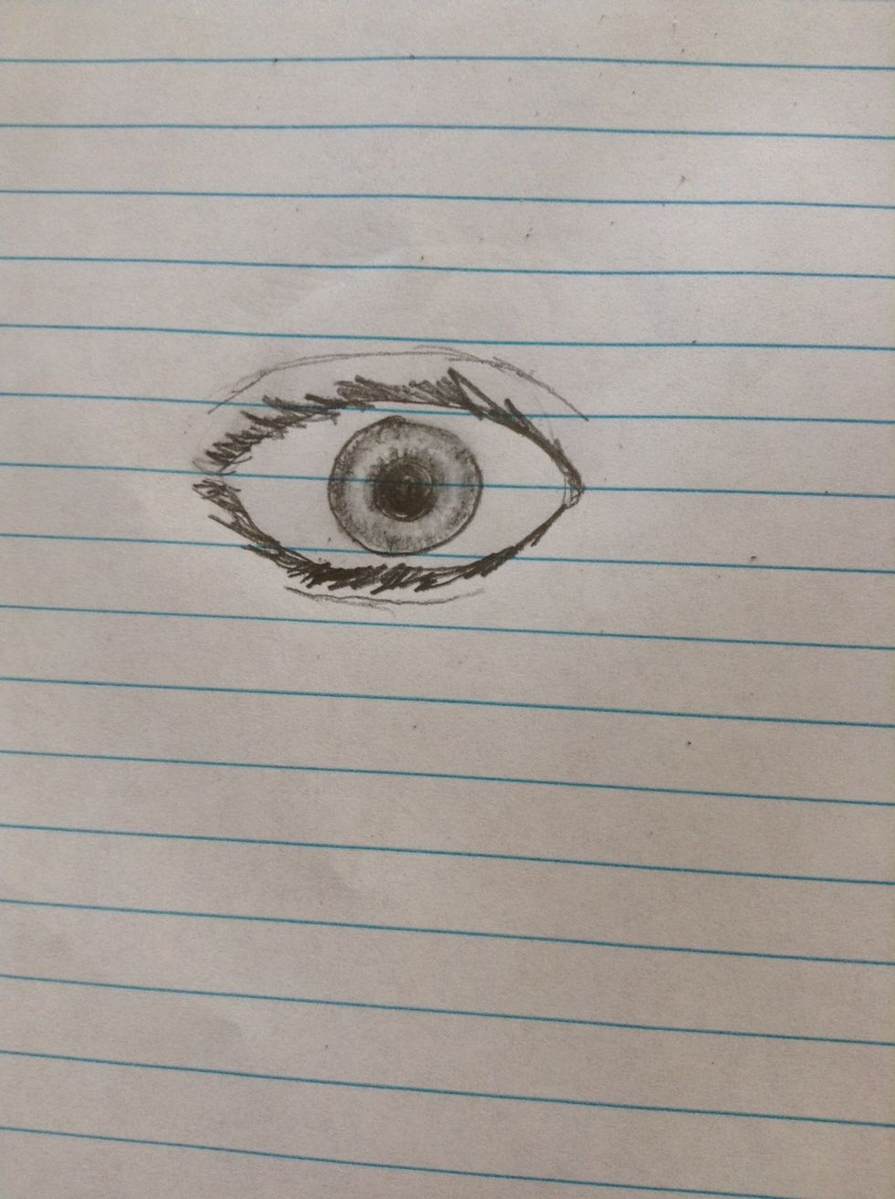 Draw the lids of the eye.