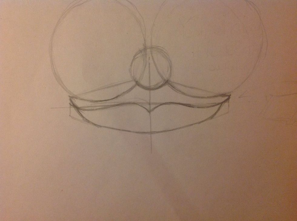 Draw the lower lip with rounded strokes.
