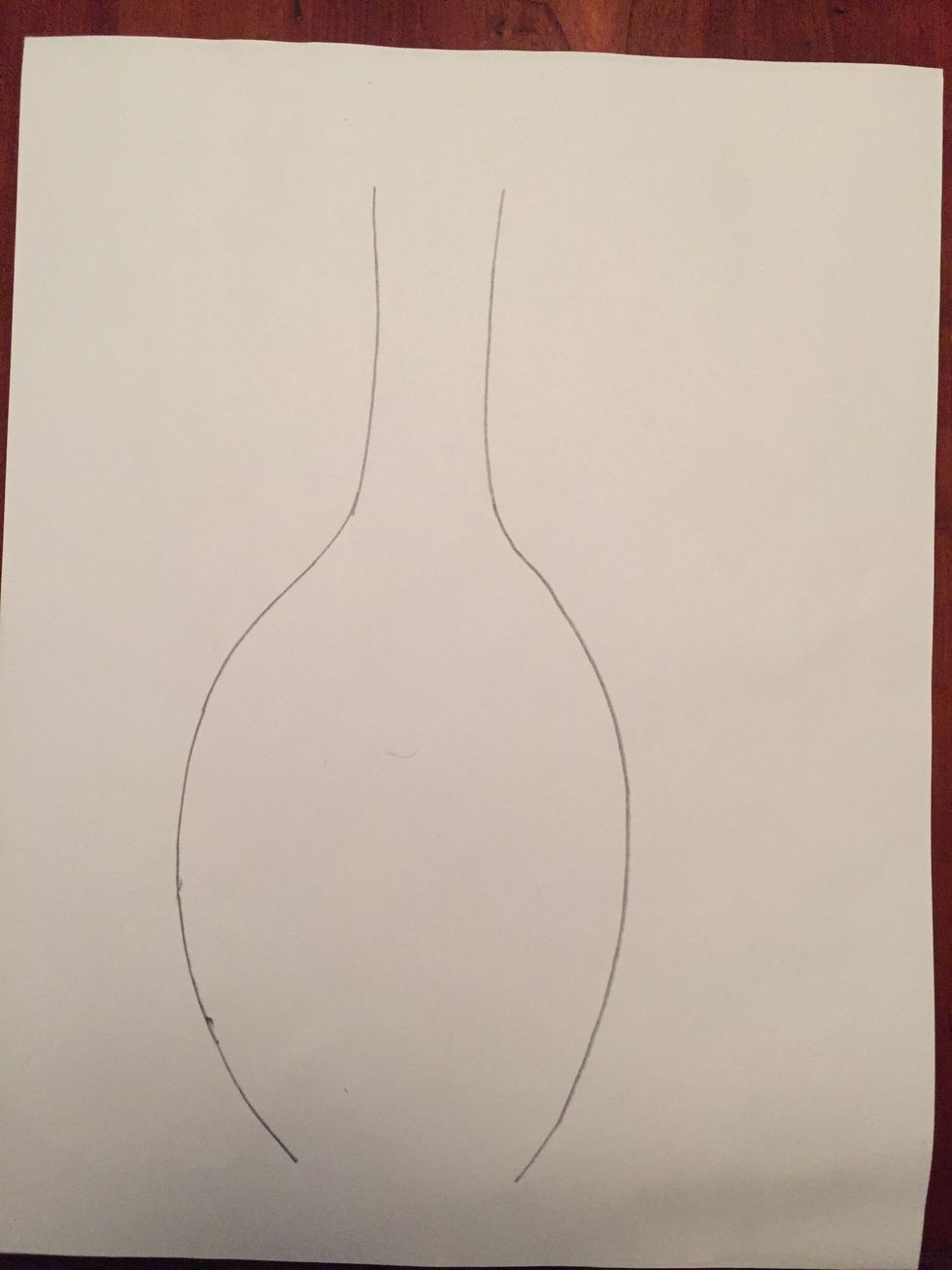 Draw the mirror image (exact opposite) for the right side of your bottle. It doesn't have to be perfect (it's more interesting if it's not!).