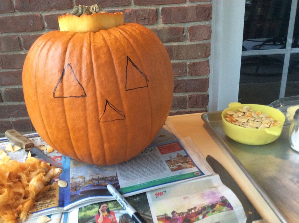 Draw the nose in the middle of the two eyes.