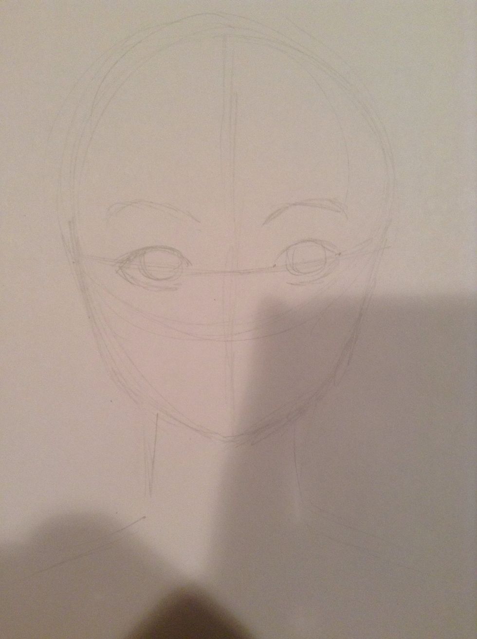 Draw the outline of the eyes and eyebrows. They should be evenly spaced.